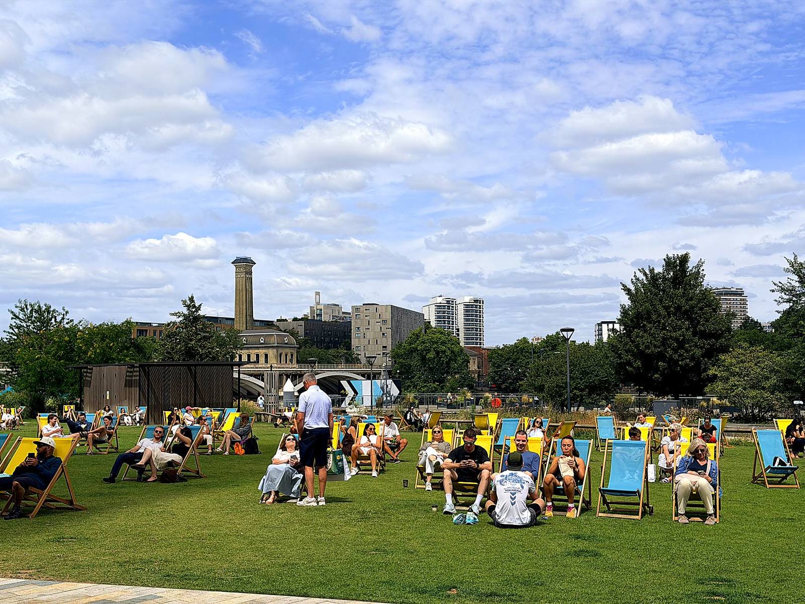 Neighbours relaxing on the lawn at Embassy Gardens